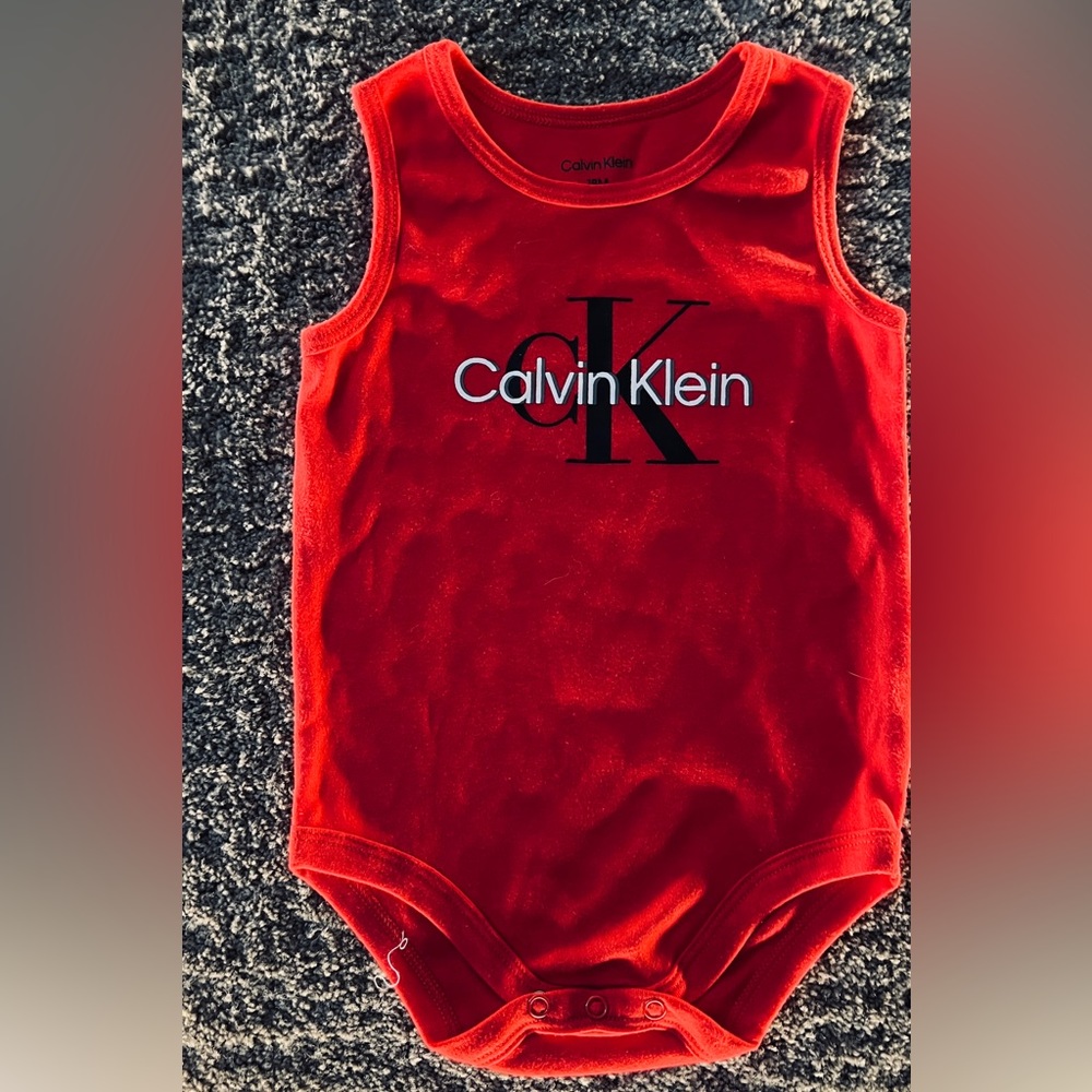Red Calvin Kline onesie brand new. Size 18 months
